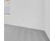 Bright bedroom featuring plush gray carpeting and natural light from a window at 144 Jones Fish Camp Rd, Edgewater, FL 32141