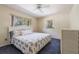 This bedroom boasts natural light, a comfy bed, and a peaceful ambiance for restful nights at 1511 Grandview Blvd, Kissimmee, FL 34744