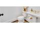 Powder room with a pedestal sink, decorative fixtures, and designer wallpaper at 1630 Lasbury Ave, Winter Park, FL 32789