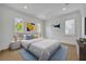 Bright bedroom featuring carpet, neutral colors, and large windows at 1630 Lasbury Ave, Winter Park, FL 32789