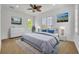 Bedroom featuring a neutral color scheme, carpet, and an overhead fan at 1630 Lasbury Ave, Winter Park, FL 32789
