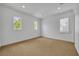 Bedroom featuring neutral carpet, recessed lighting, and windows that let in natural light at 1630 Lasbury Ave, Winter Park, FL 32789