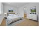 Bedroom featuring a neutral color scheme, carpet, and artwork at 1630 Lasbury Ave, Winter Park, FL 32789