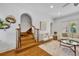 Living room featuring hardwood floors, staircase and neutral colors at 1630 Lasbury Ave, Winter Park, FL 32789
