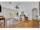 Large main bedroom with hardwood floors, a ceiling fan, and plenty of natural light at 1630 Lasbury Ave, Winter Park, FL 32789