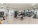 Fitness center with a variety of equipment, including treadmills and weights at 16300 County Road 455 # 704, Montverde, FL 34756