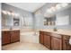 Serene bathroom with a garden tub, dual vanities, and ample space for relaxation at 1810 Trophy Bass Way, Kissimmee, FL 34746