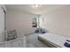 Neutral bedroom featuring a crib and single mattress at 2037 Canny Cv, Winter Park, FL 32792