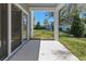 Covered patio featuring a concrete floor that offers a relaxing outdoor space, with views of a private backyard at 2037 Canny Cv, Winter Park, FL 32792