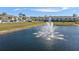 Scenic pond view with a water feature in a tranquil community setting at 2037 Canny Cv, Winter Park, FL 32792