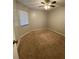 Cozy bedroom with neutral walls and carpet flooring, awaiting your personal touch at 2037 San Marcos Se Dr # 217, Winter Haven, FL 33880