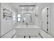 Bright bathroom showcasing a soaking tub and large shower at 2072 Starboard Dr, Geneva, FL 32732