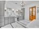 Gorgeous bathroom featuring dual sinks and cabinets at 2072 Starboard Dr, Geneva, FL 32732