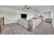 Entertainment room with a large sectional couch, tv, and pool table at 2072 Starboard Dr, Geneva, FL 32732