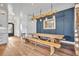 Charming dining room featuring a rustic wood table and bench seating at 2072 Starboard Dr, Geneva, FL 32732