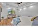 Bright main bedroom featuring a large window and modern decor at 2072 Starboard Dr, Geneva, FL 32732