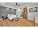 Spacious main bedroom with tray ceiling and barn door leading to the ensuite bathroom at 2072 Starboard Dr, Geneva, FL 32732