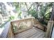 Inviting deck overlooks a serene backyard with lush greenery at 2211 Oberlin Ave, Orlando, FL 32804