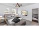 Comfortable bedroom with a neutral color palette, plush bedding, and ample natural light at 2217 Wekiva Reserve Blvd, Apopka, FL 32703