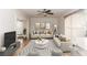 Spacious living room with neutral tones, modern decor, and lots of natural light at 2217 Wekiva Reserve Blvd, Apopka, FL 32703