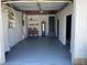 Spacious garage featuring shelving and room for storage at 2380 Corbett Rd, Orlando, FL 32826