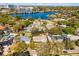 Aerial view of a single Gathering home in a mature neighborhood near a lake, outlined in red at 2424 Shrewsbury Rd, Orlando, FL 32803