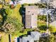 Aerial view of a home highlighting the roof, backyard, and landscaped property at 2424 Shrewsbury Rd, Orlando, FL 32803