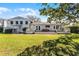 Expansive backyard featuring a large deck perfect for entertaining, and lush green lawn at 2424 Shrewsbury Rd, Orlando, FL 32803