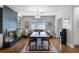 Elegant dining room with fireplace, built-in shelving, and a stylish wooden table at 2424 Shrewsbury Rd, Orlando, FL 32803