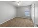 Bedroom featuring a window, carpet floors, a ceiling fan, and closet at 2701 Bullion Loop, Sanford, FL 32771