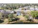 Backyard featuring a screened pool facing a serene lake at 321 Cape Sable Dr, Orlando, FL 32825