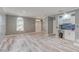 Living room showcasing neutral walls, natural light and wood-look flooring at 321 Cape Sable Dr, Orlando, FL 32825