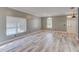 Living room features wood-look floors, neutral gray walls, and natural light at 321 Cape Sable Dr, Orlando, FL 32825