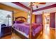 Inviting main bedroom with a king-size canopy bed, dresser, and dual night stands at 321 Cape Sable Dr, Orlando, FL 32825