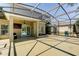 Large covered patio featuring a ceiling fan and access to the screened-in pool area at 321 Cape Sable Dr, Orlando, FL 32825