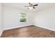 Bedroom featuring hardwood flooring and a bright window at 321 Ferdinand Dr, Longwood, FL 32750