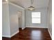 Dining room with hard wood floors, neutral paint and modern light fixture at 3548 Picciola Cutoff Rd, Fruitland Park, FL 34731