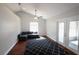 Bright living room featuring high ceilings, and a cozy dark grey sofa at 3548 Picciola Cutoff Rd, Fruitland Park, FL 34731