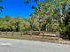 Scenery of a grassy park area with a wooden fence at 3548 Picciola Cutoff Rd, Fruitland Park, FL 34731