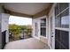 Private balcony overlooking community playground, accessible through glass doors at 3605 Conroy Rd # 537, Orlando, FL 32839