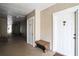 A well-lit hallway showcasing unit doors and neutral color scheme in the condominium complex at 3605 Conroy Rd # 537, Orlando, FL 32839