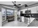 Eat-in kitchen with stainless steel appliances and large windows at 4458 Goldenrain Ct, Orlando, FL 32808