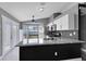 Bright eat-in kitchen with granite countertops and stainless steel appliances at 4458 Goldenrain Ct, Orlando, FL 32808
