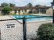 Resident use only community pool secured by fence and mature landscaping at 482 Windmeadows St # 482, Altamonte Springs, FL 32701