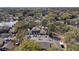 Aerial view of the community with a pond, mature trees, and ample parking at 4825 Lighthouse Cir # 4825, Orlando, FL 32808