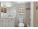 Well-lit bathroom featuring tile accents and a vanity sink at 4825 Lighthouse Cir # 4825, Orlando, FL 32808