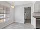 Dining area featuring light fixture, neutral-colored walls, and tiled flooring at 4825 Lighthouse Cir # 4825, Orlando, FL 32808