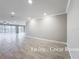 Spacious great room with tile flooring and sliding glass doors provides ample natural light and scenic views at 5647 Barletta Dr, St Cloud, FL 34771