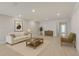 Bright living room with neutral colors, recessed lighting, and stylish furnishings offers a welcoming space at 5647 Barletta Dr, St Cloud, FL 34771