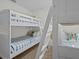 Close up of bunk beds in a carpeted room with white paint at 7805 Oak Reflection Loop, Davenport, FL 33837